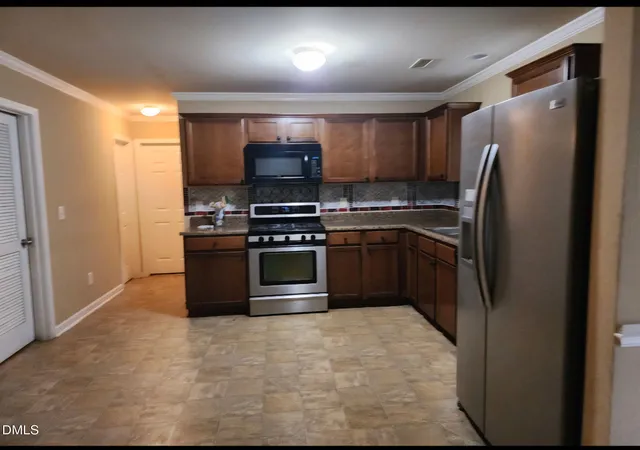 Photo 3 of Single family home for sale at 4405 Offshore Dr, Raleigh, NC 27610 | MLS# 10189640 | Listing updated on 2026-10-07