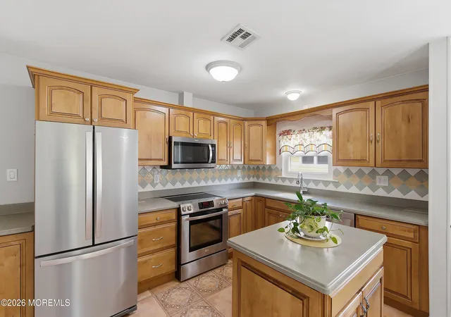 Photo 3 of Single family home for sale at 428 Saint Thomas Dr, Toms River, NJ 08757 | MLS# 22611048 | Listing updated on 2026-10-06