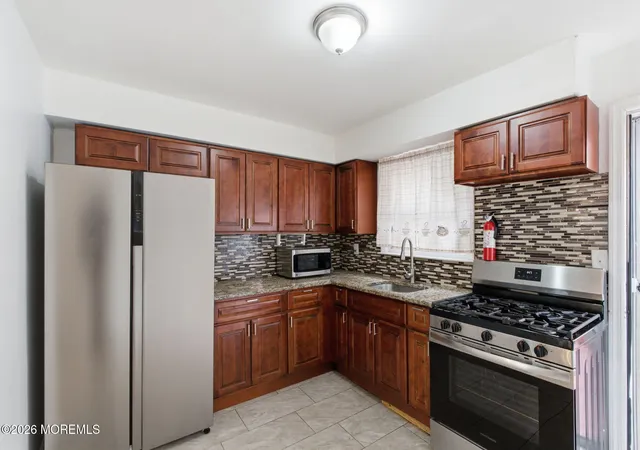 Photo 4 of Single family home for sale at 8 Van Nostrand Ave, Jersey City, NJ 07305 | MLS# 22623216 | Listing updated on 2026-09-20
