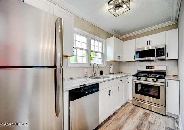5th image of 20 Jaffreyton Close #1000, Freehold, NJ 07728 | MLS# 22624432