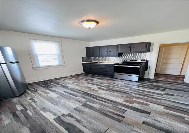 Photo 2 of Single family home for sale at 242 244 Center St, Springdale, PA 15144 | MLS# 1762726 | Listing updated on 2026-08-10