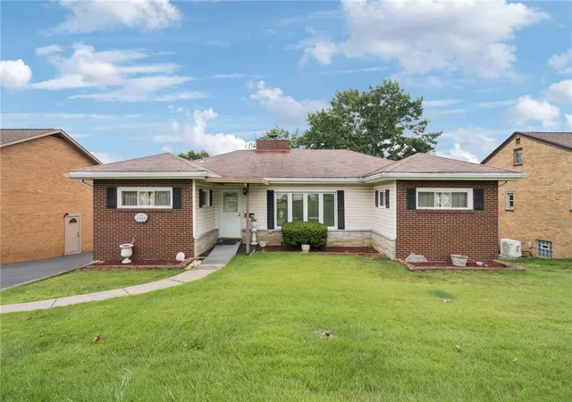 Photo 2 of Single family home for sale at 1313 Laurel Hl Dr, Homestead, PA 15120 | MLS# 1764893 | Listing updated on 2026-08-21