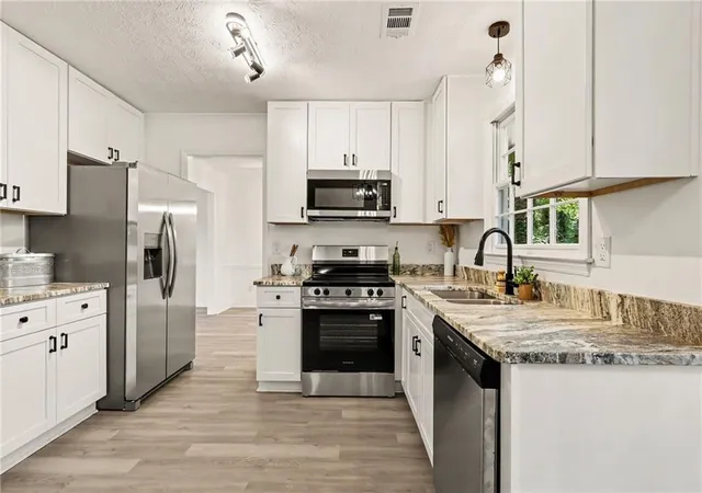 Photo 3 of Sale Pending at 1915 Lisa Ln, Riverdale, GA 30296 | MLS# 7826629 | Listing updated on 2026-08-30