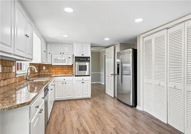 Photo 2 of Single family home for sale at 1741 Beauregard Dr Sw, Lilburn, GA 30047 | MLS# 7826115 | Listing updated on 2026-09-03