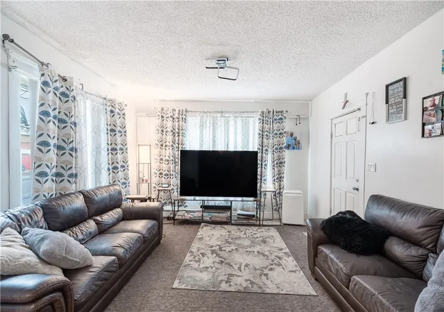 Photo 3 of Multi family home for sale at 94 Clym St, Providence, RI 02908 | MLS# 1419086 | Listing updated on 2026-09-30