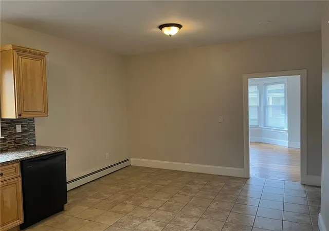 Photo 4 of Multi family home for sale at 90 Sutton St, Providence, RI 02903 | MLS# 1420482 | Listing updated on 2026-09-28
