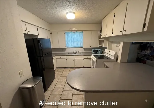Photo 3 of Single family home for sale at 103 E College Ave, Harrison, AR 72601 | MLS# 1354439 | Listing updated on 2026-08-19