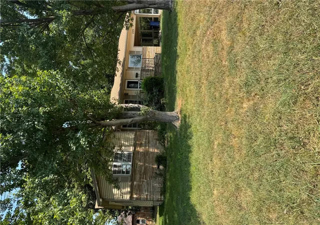 Photo 1 of Single family home for sale at 215 W Jefferson St, Siloam Springs, AR 72761 | MLS# 1358263 | Listing updated on 2026-08-10