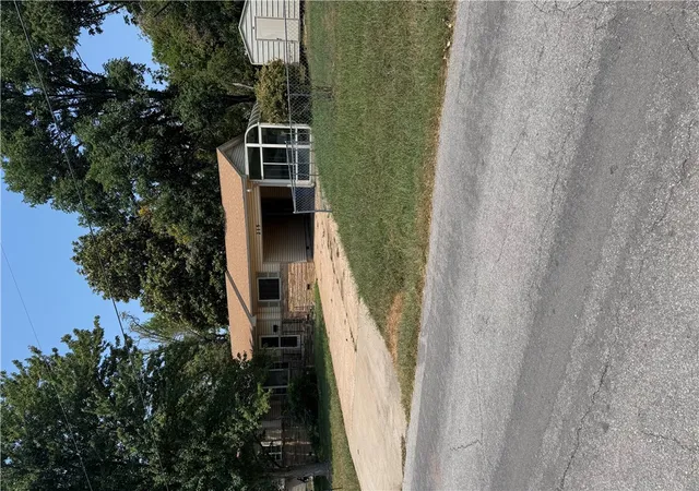 Photo 2 of Single family home for sale at 215 W Jefferson St, Siloam Springs, AR 72761 | MLS# 1358263 | Listing updated on 2026-08-10