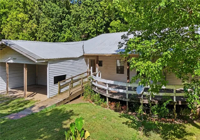 Photo 4 of Single family home for sale at 14047 Rocky Dell Holw Rd, Gravette, AR 72736 | MLS# 1359182 | Listing updated on 2026-08-21