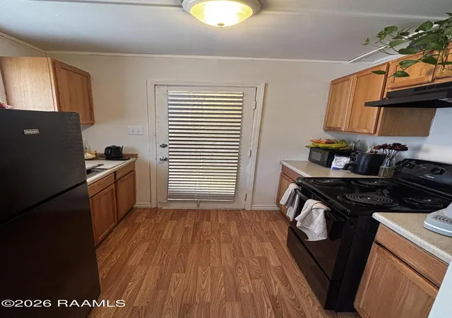Listing Photo 5 - Condo for sale in building located at 615 Yvonne St, New Iberia, LA 70560
