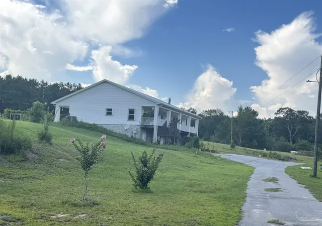 1st image of 1906 Huckaba Rd, Laurel Hill, FL 32567 | MLS# 685730