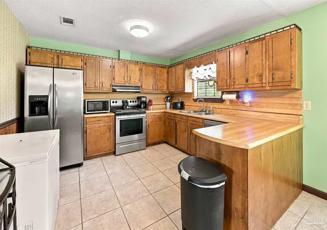 Photo 3 of Single family home for sale at 8765 Bowman Ave, Pensacola, FL 32534 | MLS# 686916 | Listing updated on 2026-08-15