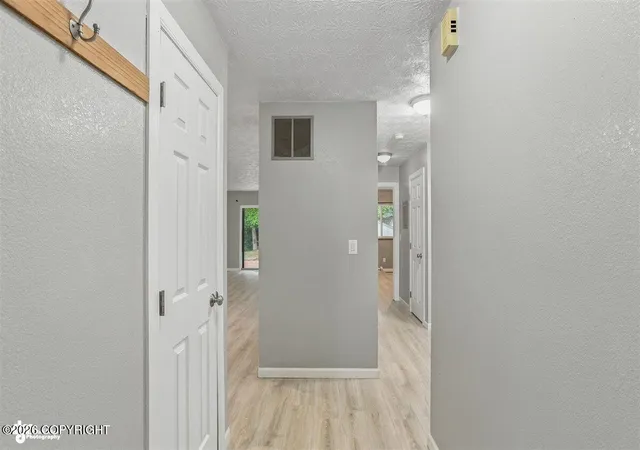 Photo 4 of Single family home for sale at 1839 Bellevue Loop, Anchorage, AK 99515 | MLS# 26-8259 | Listing updated on 2026-10-08