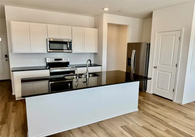 Photo 2 of Townhouse for sale at 12811 Summer Village Dr, Buda, TX 78610 | MLS# 2268085 | Listing updated on 2026-09-18