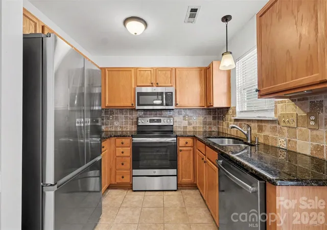 Photo 4 of Townhouse for sale at 14315 Tranters Crk Ln, Charlotte, NC 28273 | MLS# 4401065 | Listing updated on 2026-09-16