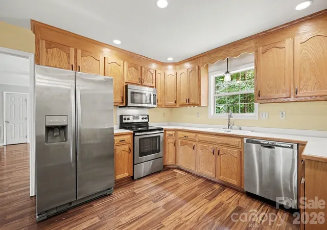 Photo 2 of Single family home for sale at 7944 Woodhill Cvs Ln, Denver, NC 28037 | MLS# 4409895 | Listing updated on 2026-09-22