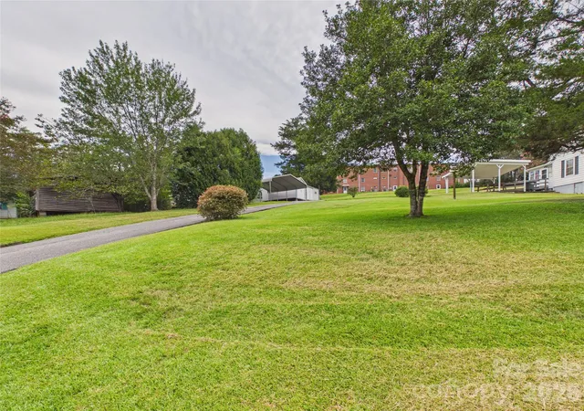 Photo 3 of Single family home for sale at 107 Mimosa Ave, Rhodhiss, NC | MLS# 4421754 | Listing updated on 2026-09-08