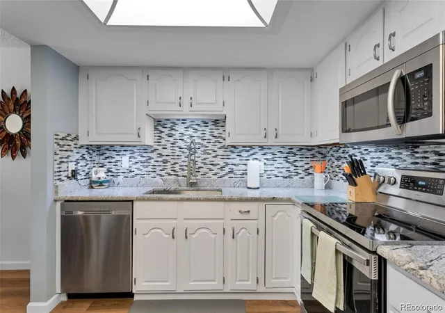 Photo 3 of Condo for sale at 13901 E Marina Dr #105, Aurora, CO 80014 | MLS# 4706573 | Listing updated on 2026-10-16
