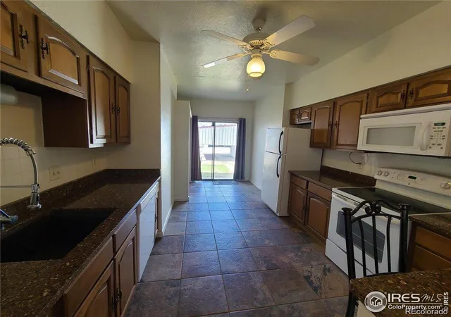 Listing Photo 4 - Condo for sale in building located at 228-230 Taylor St, Sterling, CO 80751