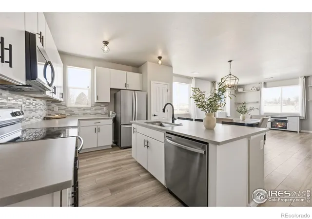 Photo 3 of Townhouse for sale at 2463 Harlequin Pl, Johnstown, CO 80534 | MLS# IR1050387 | Listing updated on 2026-10-08
