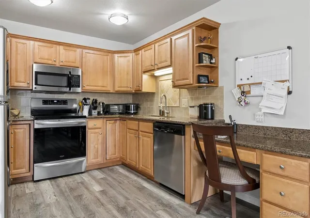 Photo 1 of Condo for sale at 9385 E Center Ave #12D, Denver, CO 80247 | MLS# 6293338 | Listing updated on 2026-09-17