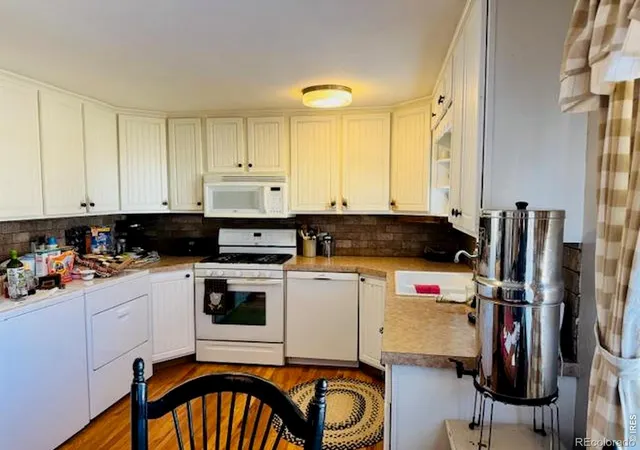 Photo 2 of Single family home for sale at 411 N Logan Ave, Fleming, CO 80728 | MLS# IR1052911 | Listing updated on 2026-09-17
