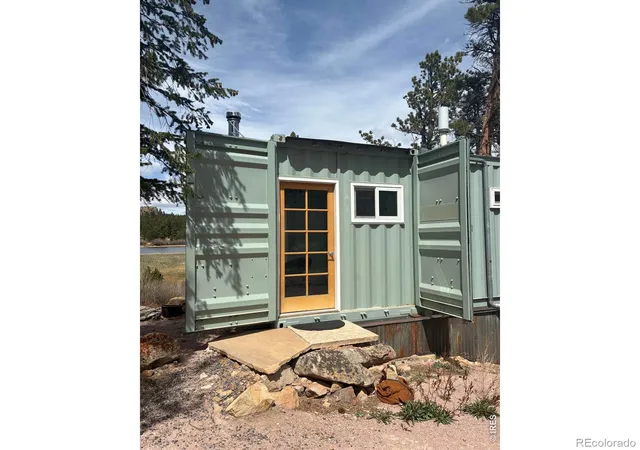 Photo 1 of Single family home for sale at 410 Monoma Rd, Red Feather Lakes, CO 80545 | MLS# IR1056449 | Listing updated on 2026-09-17