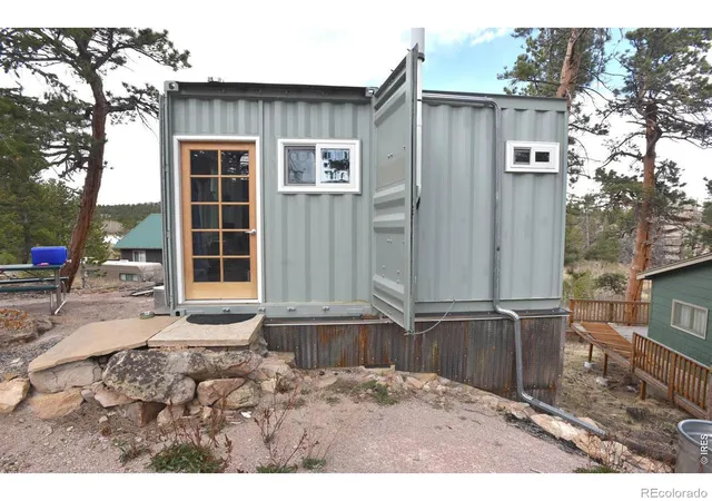 Photo 2 of Single family home for sale at 410 Monoma Rd, Red Feather Lakes, CO 80545 | MLS# IR1056449 | Listing updated on 2026-09-17