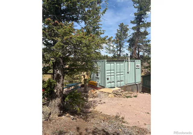 Photo 3 of Single family home for sale at 410 Monoma Rd, Red Feather Lakes, CO 80545 | MLS# IR1056449 | Listing updated on 2026-09-17