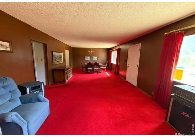 Photo 3 of Single family home for sale at 8 Estes Park Ests Dr, Lyons, CO 80540 | MLS# IR1056799 | Listing updated on 2026-09-17