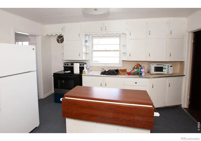 Listing Photo 5 - Condo for sale in building located at 332 Broadway St, Sterling, CO 80751