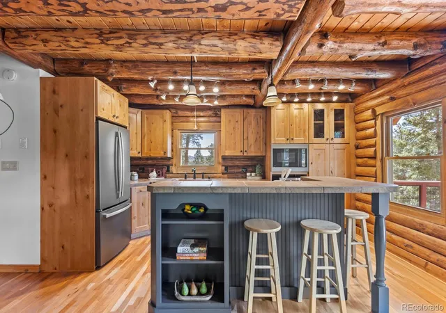 Photo 3 of Single family home for sale at 77 Gigi Ln, Evergreen, CO 80439 | MLS# 2322852 | Listing updated on 2026-09-29