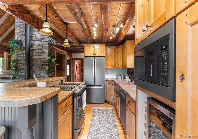 Photo 4 of Single family home for sale at 77 Gigi Ln, Evergreen, CO 80439 | MLS# 2322852 | Listing updated on 2026-09-29