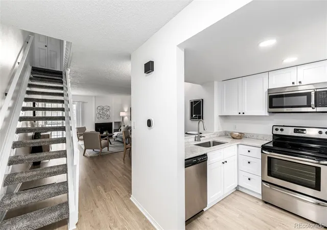 Photo 4 of Townhouse for sale at 13970 W 72nd Place #C, Arvada, CO 80005 | MLS# 5513701 | Listing updated on 2026-09-18