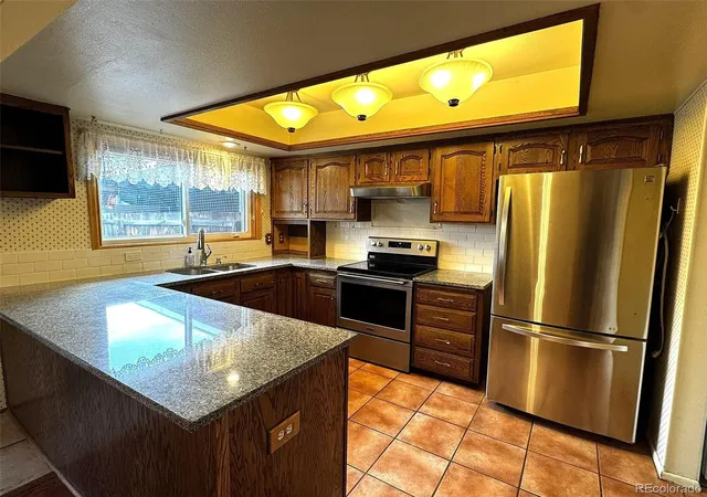 Photo 4 of Townhouse for sale at 715 S Youngfield Ct, Lakewood, CO 80228 | MLS# 8177240 | Listing updated on 2026-09-24
