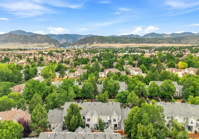 Photo 2 of Townhouse for sale at 9647 W Chatfield Ave #E, Littleton, CO 80128 | MLS# 4047478 | Listing updated on 2026-09-08