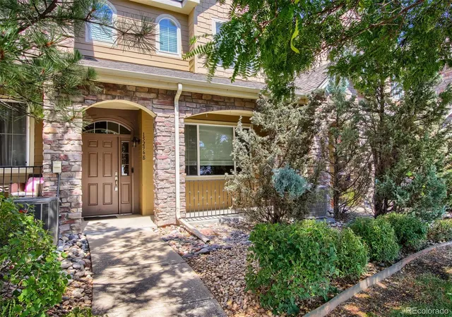 Photo 1 of Townhouse for sale at 15296 W 66th Drive #E, Arvada, CO 80007 | MLS# 6821001 | Listing updated on 2026-09-17