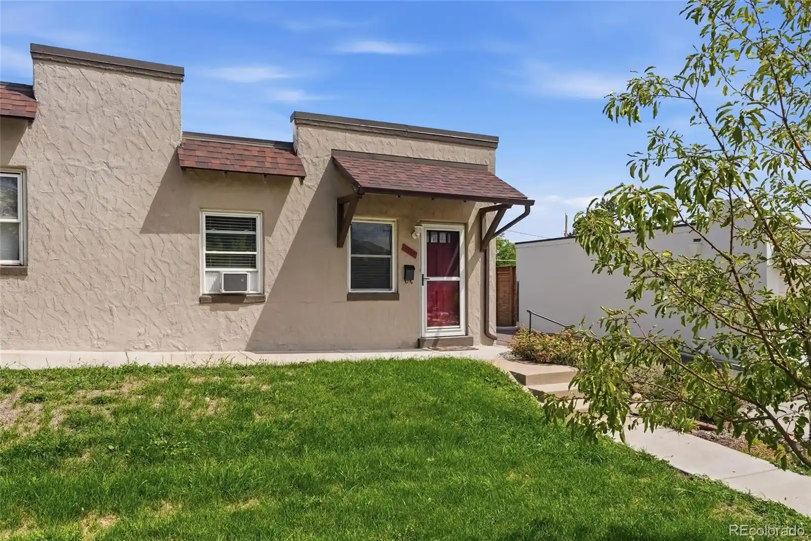 Listing Photo 1 - Condo for sale in 2660 Utica St located at 2660 Utica St, Denver, CO 80212 - Unit 2660 Utica St