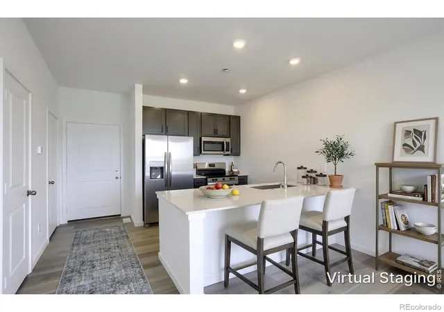 Photo 2 of Townhouse for sale at 3053 Gladstone Ave, Loveland, CO 80538 | MLS# IR1067239 | Listing updated on 2026-09-25