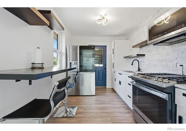 Photo 4 of Single family home for sale at 1309 Florence St, Aurora, CO 80010 | MLS# IR1067559 | Listing updated on 2026-09-25
