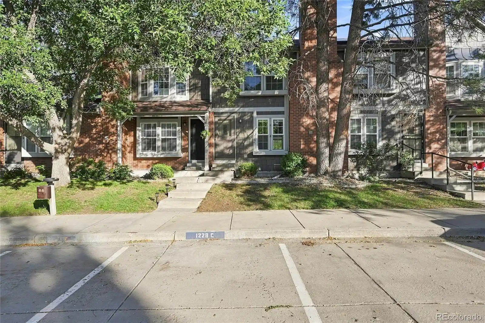Listing Photo 1 - Condo for sale in 1228 S Flower Cir located at 1228 S Flower Cir, Lakewood, CO 80232 - Unit 1228 S Flower Cir