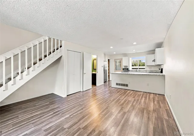 Photo 3 of Townhouse for sale at 1228 S Flower Cir #C, Lakewood, CO 80232 | MLS# 8258664 | Listing updated on 2026-09-16