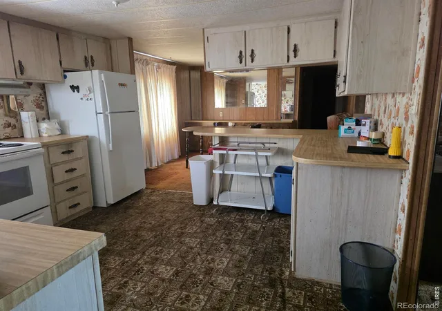Photo 4 of Single family home for sale at 1213 Macintyre Ct, Dacono, CO 80514 | MLS# IR1068920 | Listing updated on 2026-09-17