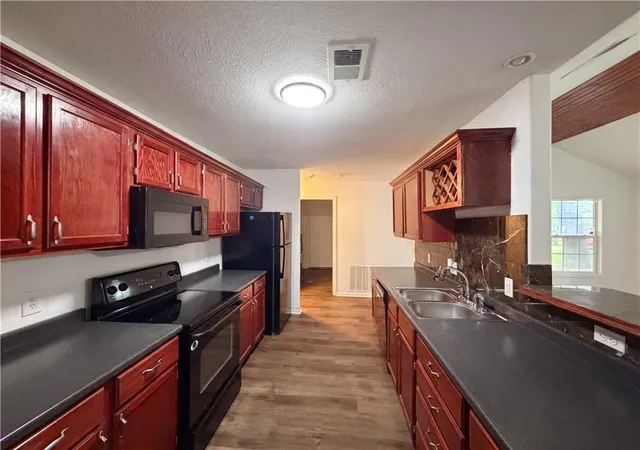 Photo 2 of Single family home for sale at 905 S Butler Ter, Harrisonville, MO 64701 | MLS# 2623413 | Listing updated on 2026-09-17