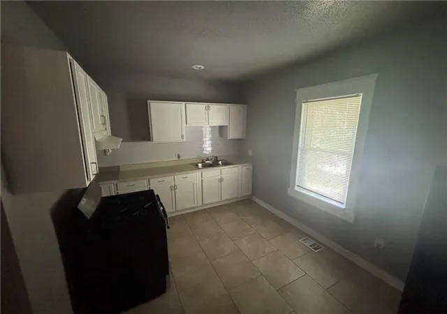 Photo 4 of Single family home for sale at 1014 Agnes Ave, Kansas City, MO 64127 | MLS# 2624932 | Listing updated on 2026-09-17