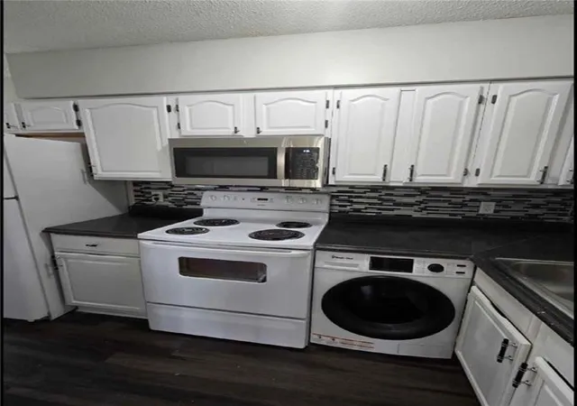 Photo 3 of Multi family home for sale at 15208 Bellaire Ave, Grandview, MO 64030 | MLS# 2641316 | Listing updated on 2026-09-16