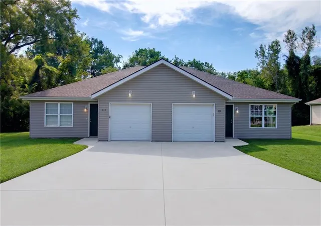 Photo 1 of Multi family home for sale at 207 209 Sycamore St, Harrisonville, MO 64701 | MLS# 2642121 | Listing updated on 2026-09-16