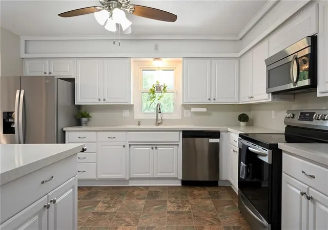 Photo 4 of Single family home for sale at 6115 Larson Ave, Kansas City, MO 64133 | MLS# 2642571 | Listing updated on 2026-09-17