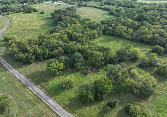Photo 1 of Land for sale at Lot 4 Travis Ln, Harrisonville, MO 64701 | MLS# 2642778 | Listing updated on 2026-09-17